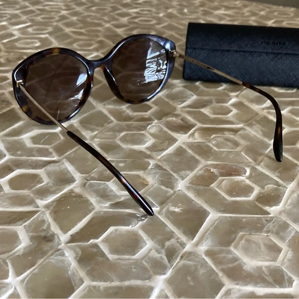 Prada SPR18XS sunnies in 2AU4P0 ‘Havana’